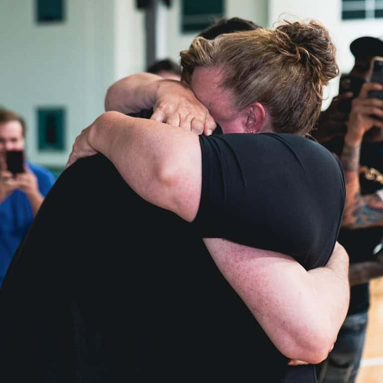 Jake LaRavia hugs his mom.